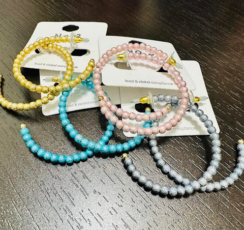 ASSORTTED HOOP EARRINGS