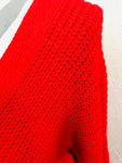 THE RED SWEATER