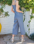 SLEEVELESS WOVEN JUMPSUIT