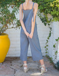 SLEEVELESS WOVEN JUMPSUIT